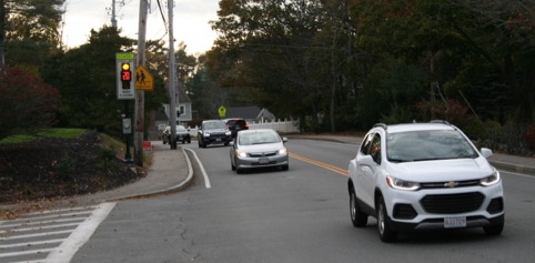 Flashing “School Zone” Speed Limit Sign on Washington Street
This figure is an image showing a flashing sign on Washington Street alerting motorists that they are approaching the crosswalk shown in Figure 25.